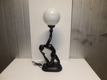 Art Deco Style Nude Lady Holding Round Iridescent Glass Globe Lamp