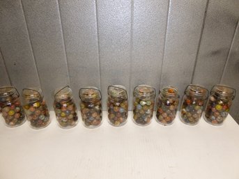Lot Of Nine 7-inch-tall Jars Of Vintage Glass Shooter Marbles