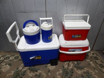 3 Igloo Coolers And 2 Igloo Thermoses
