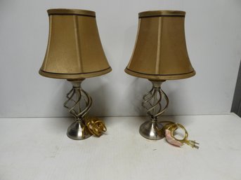 Pair Of Contemporary Table Lamps Featuring Chrome Base With Spiral Twist Design