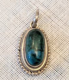 Chrysocola Oval Cut Pendant With Sterling Silver Backing