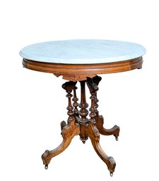 Antique Victorian Parlor Table With White Marble Top And Walnut Base Scroll Formed Legs /small Raised Casters