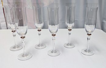 Clear Glass Champagne Flutes With A Decorative Metallic Antique Gold/Bronze Ball Accent