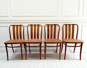 Four Bentwood Caned Blond Wood Chairs