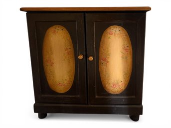 Rustic Cabinet With Painted Floral Oval Accents On Doors