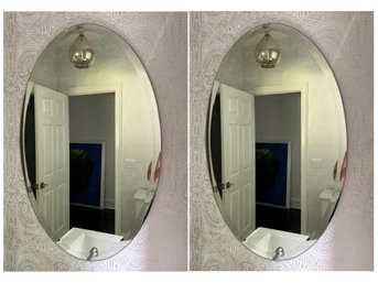 Pair Of Beveled Oval Mirrors