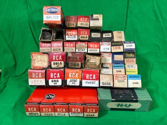 Vintage Vacuum Tubes From Various Manufacturers, Including RCA, Raytheon, Sylvania, And Tung-Sol.