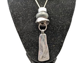 A Striking Modernist Silver Tone Pendant Necklace