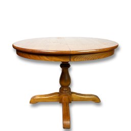 Walter Of Wabash Solid Oak Pedestal Table With 2 Leaves