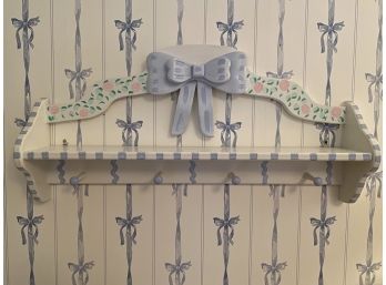 Wall Shelf With Bow Detail And Knobs