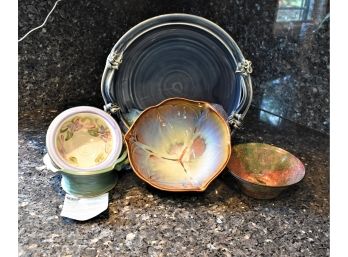 Variety Of Pottery And Stoneware Platters And Bowls