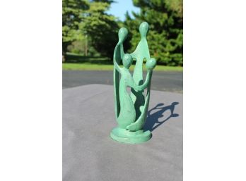 Sculpted Piece Of Family Together