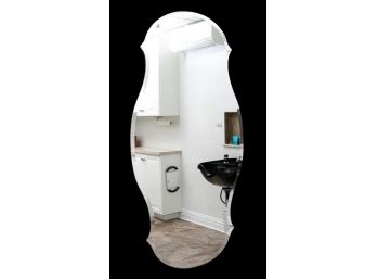 Uniquely Shaped Wall Mirror With Beveled Edge
