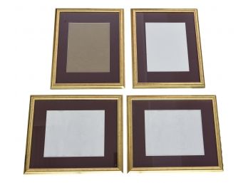 Four Empty Picture Frames With Matting
