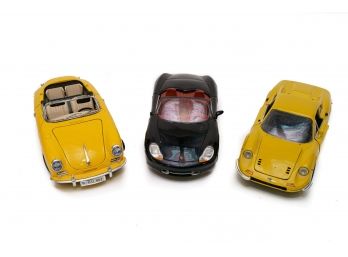 Collectible Scaled Model Cars - 2 Porshe And 1 Ferrari
