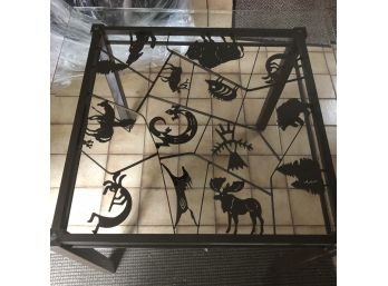 Glass Top Table With Southwest Inspired Metal Base