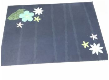 Pretty Navy Rug With Different Colored Flowers
