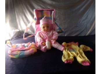 Baby Girl In Carry Backpack And Accessories