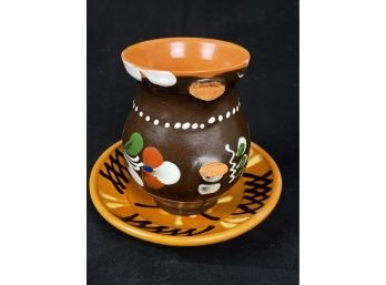 Brown Yellow And Orange Pottery Cup And Saucer