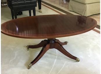 Oval Shaped Mahogany Coffee Table On Casters