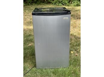 A Magic Chef Small Refrigerator