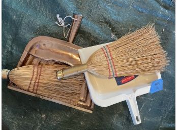 2 Dust Pans And 2 Whisk Brooms.