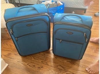 Two Pcs Samsonite Blue Fabric Rolling Suitcases.