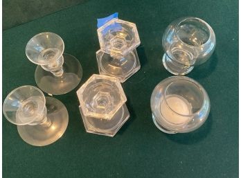 3 Pairs Of Candlesticks Of Varying Shorter Sizes.