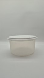 Round Translucent Plastic Cake Or Other Storage Container With White Lid
