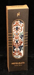 Nefelibata Brand Woven Guitar Strap Featuring An Intricate Floral Pattern