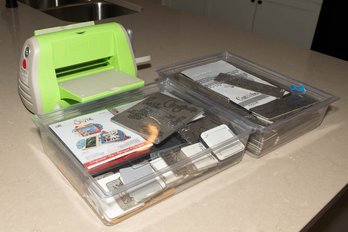 Cuttlebug, A Manual Die-cutting And Embossing Machine From Provo Craft (often Branded Under Cricut)