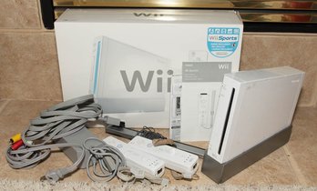 Nintendo Wii Console Bundle, Includes The Console, A Wii Remote, Cables And Wii Play Disc