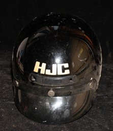 Black HJC FG2 Fiberglass Open-face Half Motorcycle Helmet.