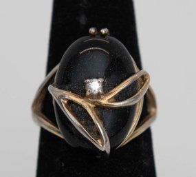 Vintage Black Onyx And Diamond Cocktail Ring Featuring Prominent, Smooth, Oval-shaped Black Onyx Caboch