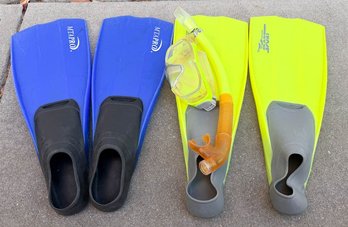 Two Sets Full-foot Swim Fins Alongside A Snorkeling Set