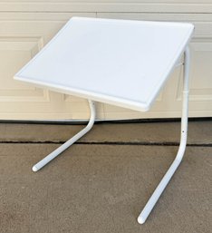 White, Adjustable Folding Table Is A Versatile Piece Of Furniture Often Referred To As A Table-Mate Or A TV Tr