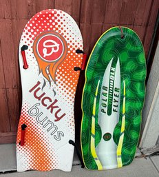 Foam Snow Sleds, Featuring A White Lucky Bums Toboggan And A Green Flexible Flyer Polar DLX Model.
