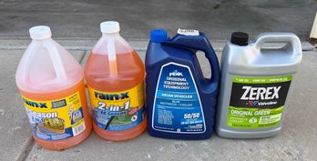 Partial Bottles Of Rain-X 2-in-1 All Season Windshield Washer Fluid And Peak And Zerex Anti Freeze