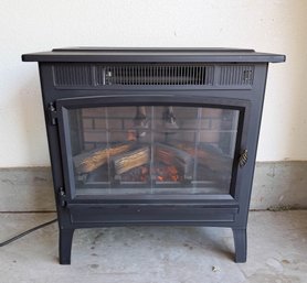 Duraflame Freestanding Electric Fireplace Stove Features A 3D Flame Effect And A Black Finish