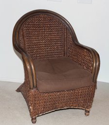Vintage Pier One Wicker Armchair With Rattan Frame And A Dark Brown Cushioned Seat