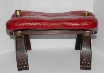 1950s Moroccan Camel Stool Features A Distinctive Red Leather Cushion With Brass Accents