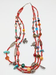 Multi-strand Treasure Necklace W/ Sterling Silver Charms.