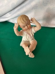 061) Antique German Gebruder Heuback Bisque Porcelain Piano Baby Figurine