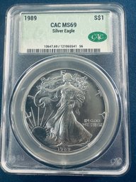 1989 SILVER AMERICAN EAGLE $1 99.9 FINE SILVER COIN- CAC CERTIFIED MS69