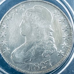 1827 CAPPED BUST 50 CENT HALF DOLLAR SILVER COIN - IN PLASTIC CAPSULE
