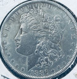 1886 MORGAN SILVER DOLLAR COIN - IN FLIP