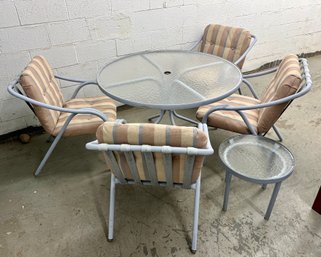 Vintage Metal Patio Dining Set, Including A Table, Four Chairs With Cushions, And A Side Table