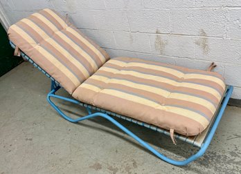 Vintage Chaise Lounge With Blue Metal Frame And Striped Cushion