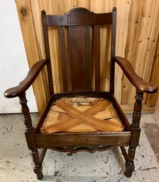 Vintage Jacobean Revival Arm Chair With Turned Legs And Wood Panel Backrest.