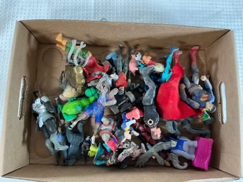 Lot Of Assorted Action Figures Including Superman, Peter Pan, Mickey Mouse, And More